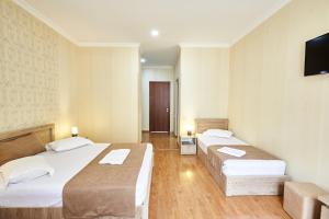 Katil atau katil-katil dalam bilik di Hotel Old Borjomi