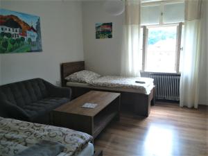 Un pat sau paturi într-o cameră la Apartmán s výhľadom