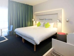 Voodi või voodid majutusasutuse Ibis Styles Nivelles toas