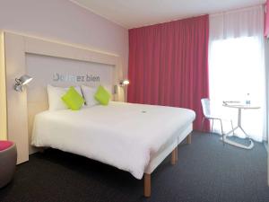 Voodi või voodid majutusasutuse Ibis Styles Nivelles toas