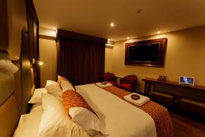 TV o dispositivi per l'intrattenimento presso Yawar Inka Hotel