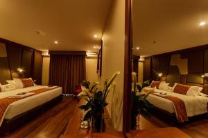 Letto o letti in una camera di Yawar Inka Hotel