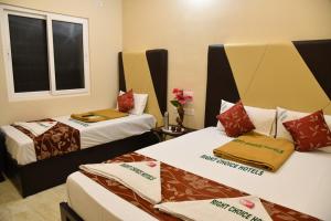 Postel nebo postele na pokoji v ubytování Rightchoicehotels