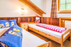 A bed or beds in a room at Hacklbauer