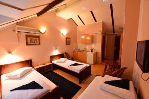 Postel nebo postele na pokoji v ubytování Apartments & Accommodation Stojic