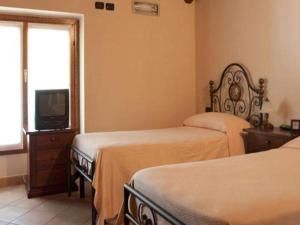 Voodi või voodid majutusasutuse La Cavallina azienda agrituristica toas