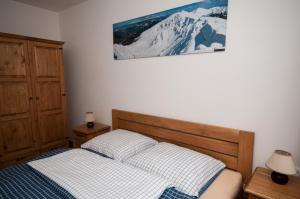 Posteľ alebo postele v izbe v ubytovaní Apartmány Biela Púť - Jasná nr. 3