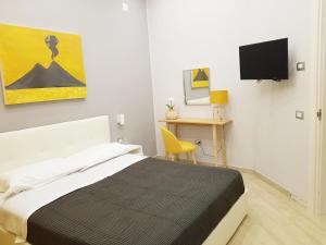 Postel nebo postele na pokoji v ubytování Solfatara Suites B&B