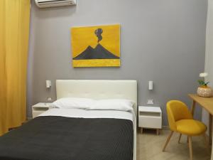 Postel nebo postele na pokoji v ubytování Solfatara Suites B&B