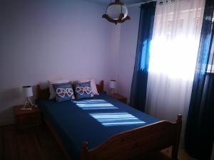 Łóżko lub łóżka w pokoju w obiekcie Dom nad Wigrami