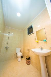 Koupelna v ubytování Hotel Gori