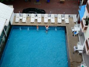 Bazén v ubytování MANGO Lagoon Place nebo v jeho okolí