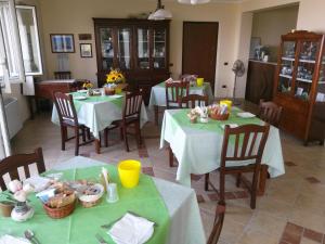 Restaurant ou autre lieu de restauration dans l'établissement B&B L'Eucalipto