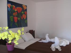 Postel nebo postele na pokoji v ubytování A1 Hotel Riga City Center