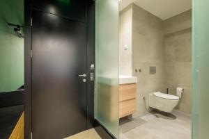 Koupelna v ubytování R34 Boutique Hotel