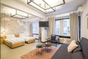 Postel nebo postele na pokoji v ubytování R34 Boutique Hotel