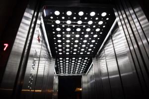 a building with a ceiling with white polka dots on it at Akroyiali Resort in Vasiliki
