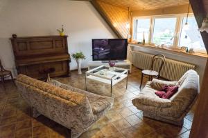 O zonă de relaxare la Moderne 70 qm Wohnung mit großer Dachterrasse