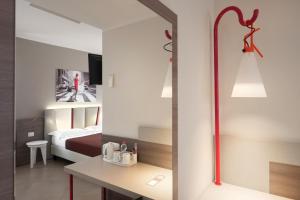 Postel nebo postele na pokoji v ubytování Guesthouse Verona