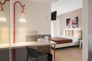 Postel nebo postele na pokoji v ubytování Guesthouse Verona