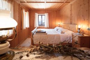 Llit o llits en una habitació de Albergo Pa' Krhaizar