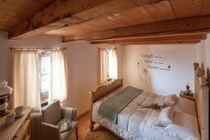 Llit o llits en una habitació de Albergo Pa' Krhaizar