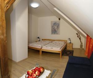 Postel nebo postele na pokoji v ubytování Penzion U Haničky