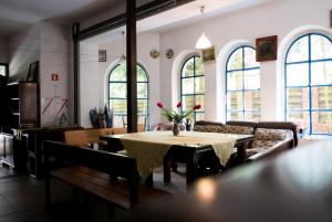 a living room with a table and a couch at Baltic in Łeba
