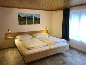 Postel nebo postele na pokoji v ubytování Hotel Restaurant Simplon
