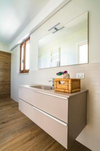 a bathroom with a sink and a mirror at B&B Villa Maria Pia in Monopoli +65 photos