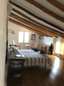 Postel nebo postele na pokoji v ubytování Casa María