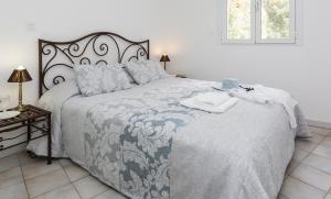 Postel nebo postele na pokoji v ubytování Residence Mare e Monte