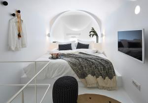 Ένα ή περισσότερα κρεβάτια σε δωμάτιο στο Olia Villas & Suites +39 φωτογραφίες