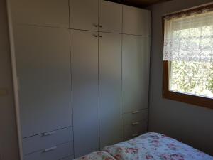 Postel nebo postele na pokoji v ubytování Feriendomizil am Zeulenrodaer Meer