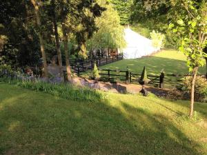 A garden outside Grimscote Manor Hotel 