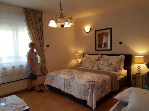 Posteľ alebo postele v izbe v ubytovaní Apartman Iskra