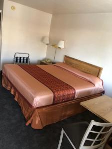 Letto o letti in una camera di Claridge Inn - St. George