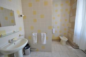 Koupelna v ubytování La Riviere + 3 fotografie