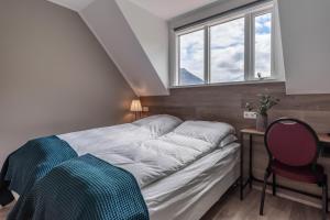 Postel nebo postele na pokoji v ubytování Holt Inn