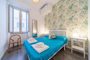 Un pat sau paturi într-o cameră la Good Vibes Rome comfort and quality