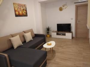 Posezení v ubytování Apartman Laura + 7 fotografií
