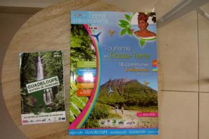 Certifikát, hodnocení, plakát nebo jiný dokument vystavený v ubytování Or bleu-Bungalow volcan Soufriere-Vue sur mer