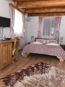 Posteľ alebo postele v izbe v ubytovaní Rustic Inn River 2
