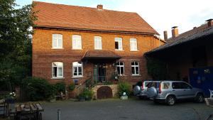 a house with a car parked in front of it at Staffel`s Hob in Oberrosphe