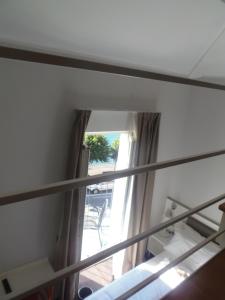 Voodi või voodid majutusasutuse Albergo Dongo toas
