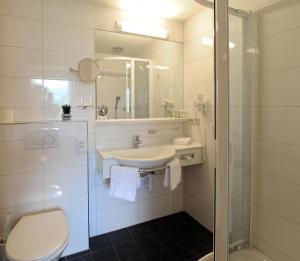 Koupelna v ubytování BOUTIQUEHOTEL das edelweiss