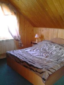 Postel nebo postele na pokoji v ubytování U Pana Ivana