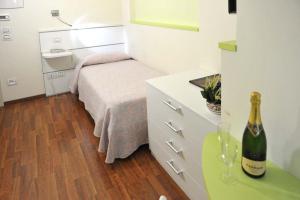Postel nebo postele na pokoji v ubytování Hotel Benessere Villa Fiorita