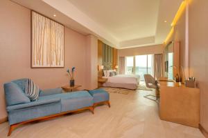 Royal Central Hotel and Resort The Palm客房内的一张或多张床位