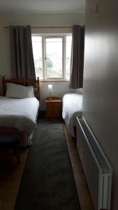 Postel nebo postele na pokoji v ubytování Scapaflow B&B